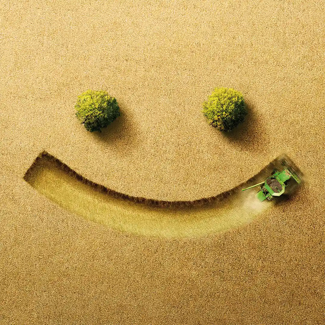 Bayer smiley face in a field made by a farmer Hero